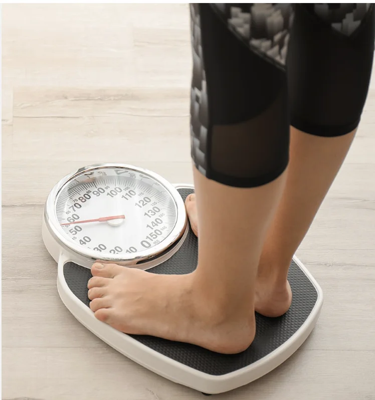Bare feet standing on a bathroom scale: a single outcome measurement.